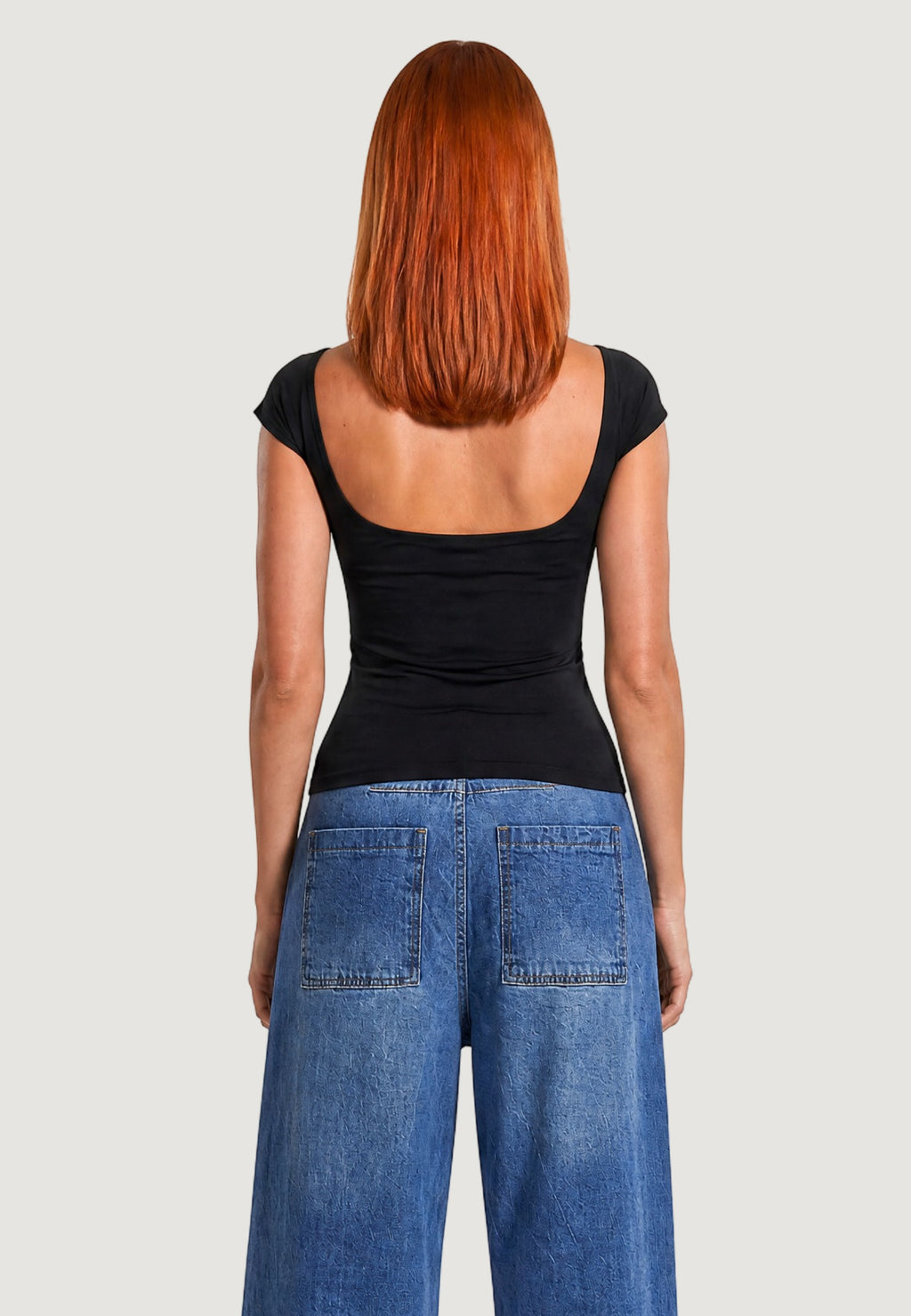 TOP CON SCOLLO DIETRO